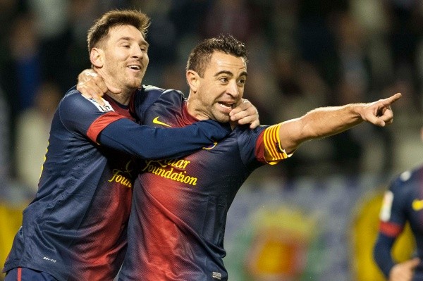 Messi y Xavi como compañeros en Barça. (Getty)