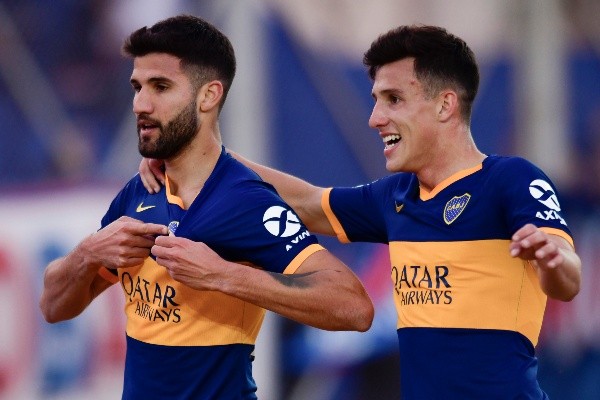 Lisandro López (izquierda) celebrando un gol en Boca (Getty Images)