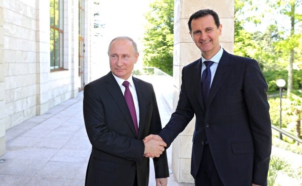 Vladimir Putin y Bashar al-Assad: Getty