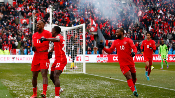 GettyImages/ Seleção do Canadá comemorando gol.