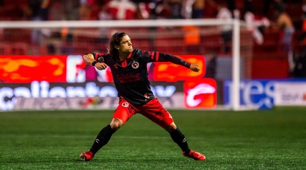 TIJUANA, MEXICO - APRIL 15: Joaquin Montecinos of Tijuana celebrates after scoring his team's first goal during the 14th round match between Club Tijuana and America as part of the Torneo Grita Mexico C22 Liga MX at Caliente Stadium on April 15, 2022 in Tijuana, Mexico. (Photo by Francisco Vega/Getty Images)-Not Released (NR)