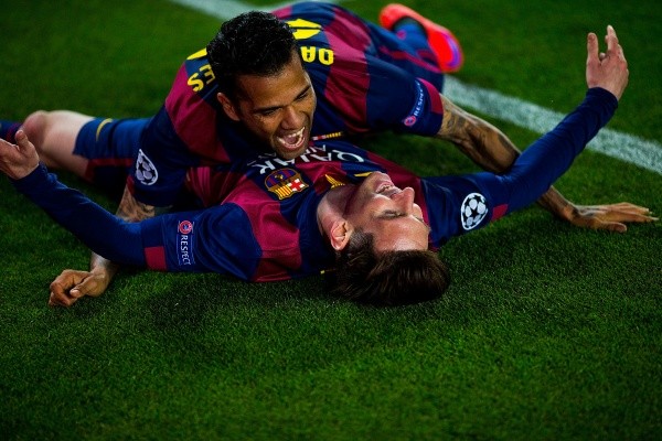 Messi y Dani Alves en Barcelona (Getty)
