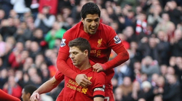 Steven Gerrard of Liverpool celebrates with Luis Suarez after scoring / Clive Brunskill/Getty Images