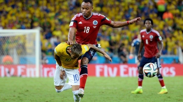 The exact moment when Zuñiga breaks Neymar Jr in Brazil 2014. ((Jamie McDonald/Getty Images)