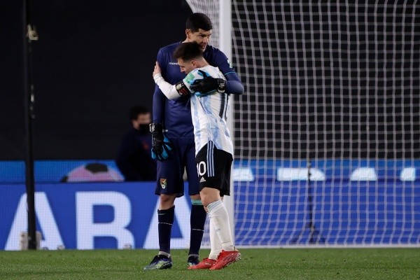 Carlos Lampe y Lio Messi (Getty)