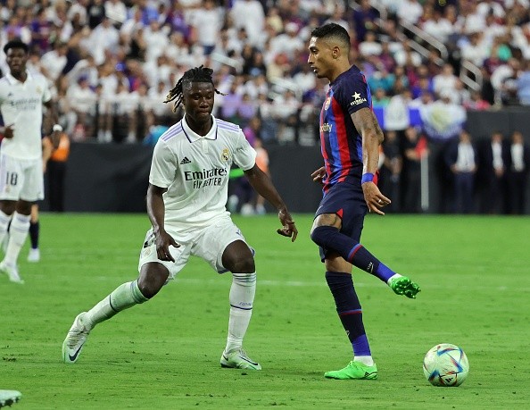 Acción de juego entre Real Madrid y Barcelona. Getty.