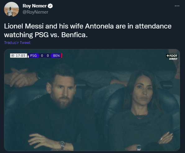 Messi y Antonela Roccuzzo, en la tribuna viendo PSG vs. Benfica (Twitter @RoyNemer)