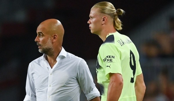 Pep Guardiola y Erling Haaland: Getty