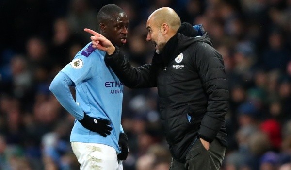 Pep Guardiola y Benjamin Mendy: Getty