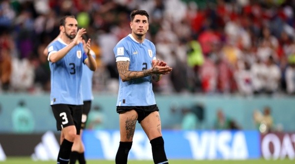 Godín y Giménez, tras el partido ante Corea del Sur (Getty Images)