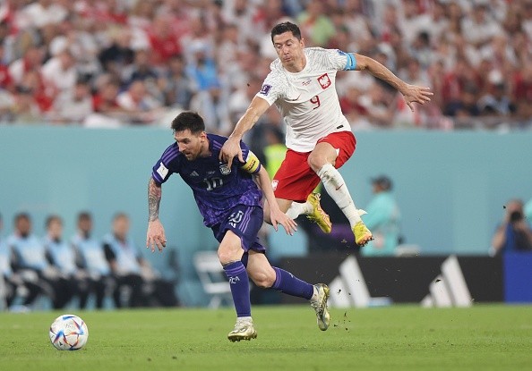 Messi y Lewy en juego de Qatar 2022. Getty.