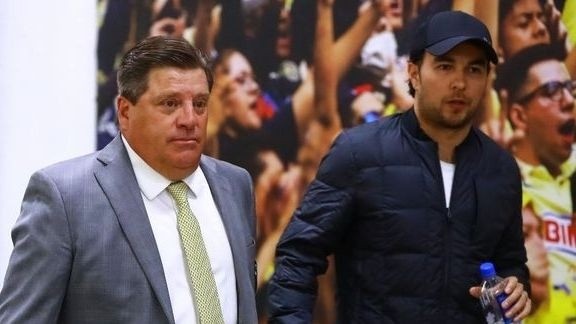 Miguel Herrera y Sergio Pérez (archivo)