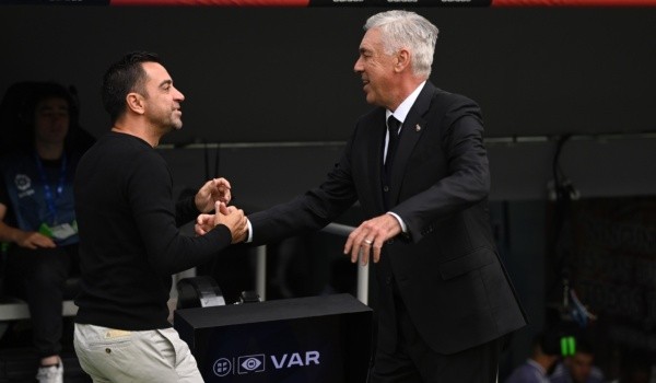 Xavi y Carlo Ancelotti: Getty