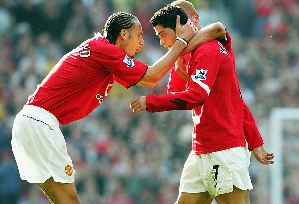 Ferdinand y Cristiano Ronaldo en juego con Manchester United. Getty.