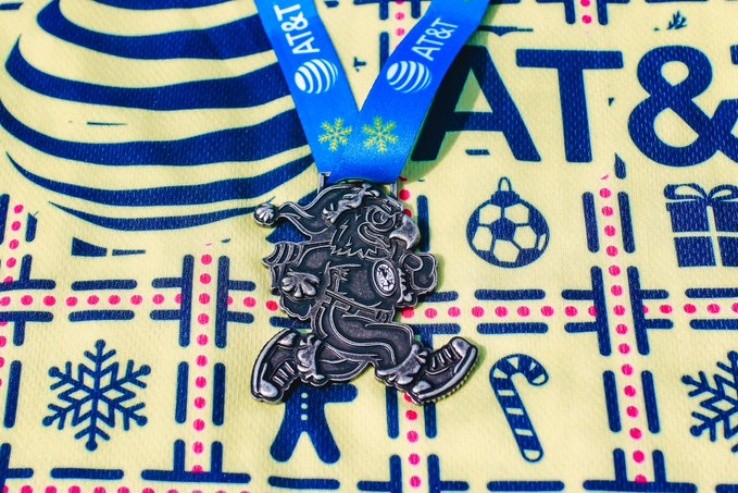 Playera y medalla América