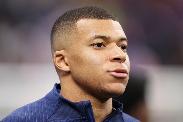 AL KHOR, QATAR - DECEMBER 10: Kylian Mbappe of France warms up prior to the FIFA World Cup Qatar 2022 quarter final match between England and France at Al Bayt Stadium on December 10, 2022 in Al Khor, Qatar. (Photo by Elsa/Getty Images)